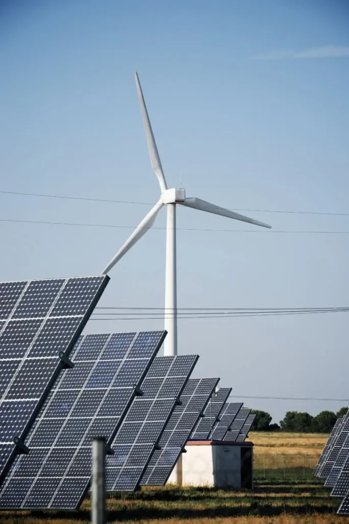 Windmills and photovoltaic panels for energy production.